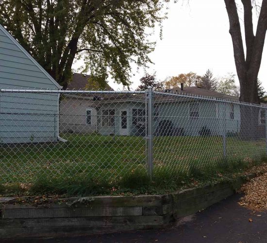 4 Galvanized Chain Link Fence On Retaining Wall